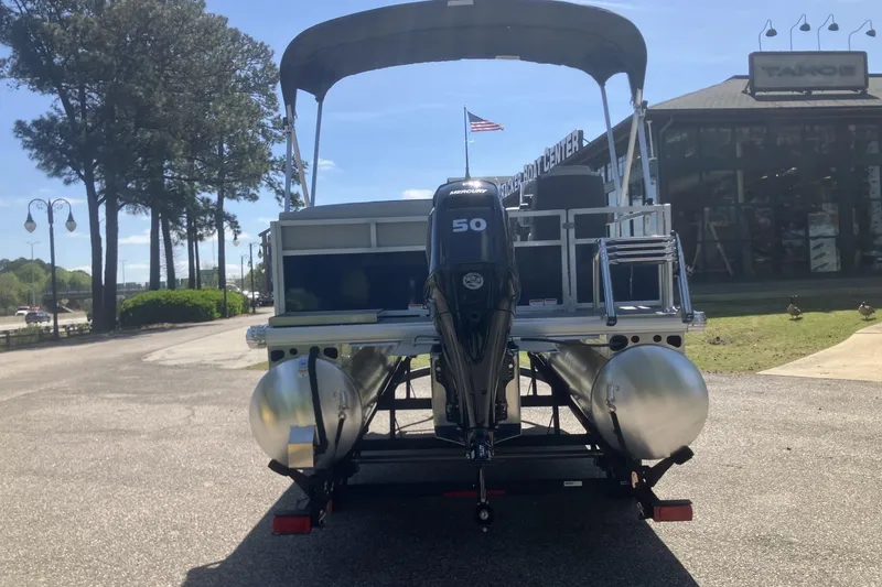 Slide: The Image of 2026 Sun Tracker Bass Buggy 16 XL Select pontoon boat with Mercury 50 engine. - 2