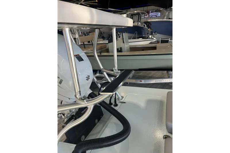 Slide: The Image of 2026 East Cape Evo 17X boat interior with engine and seating details. - 4
