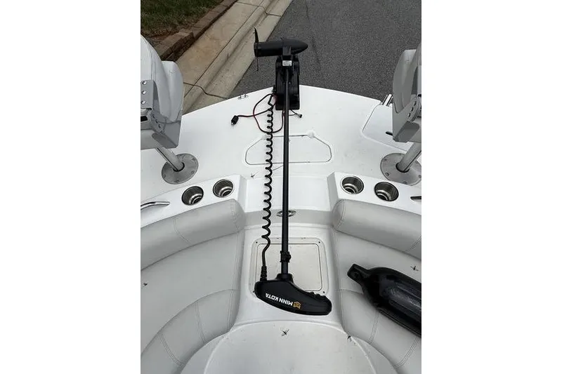 Slide: The Image of 2021 Hurricane SunDeck Sport 201 OB boat with Minn Kota trolling motor. - 4