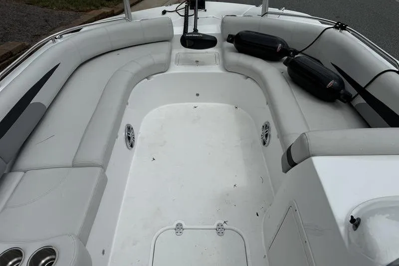 Slide: The Image of 2021 Hurricane SunDeck Sport 201 OB boat interior with spacious seating and clean design. - 6