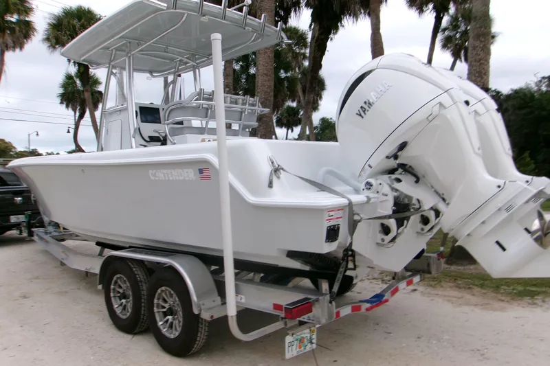 Slide: The Image of 2026 Contender 28 Tournament boat on trailer with Yamaha outboard motor. - 1