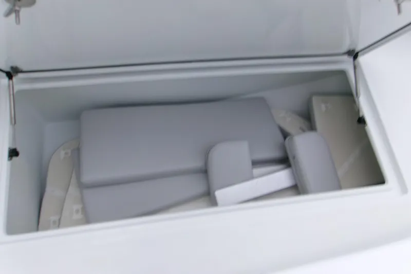 Slide: The Image of Storage compartment of 2026 Contender 28 Tournament boat with cushions inside. - 11