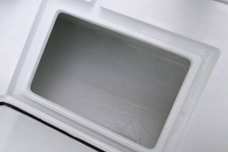 Slide: The Image of Open storage compartment on 2026 Contender 28 Tournament boat. - 12