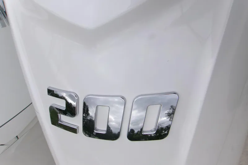 Slide: The Image of Close-up of chrome '200' emblem on 2026 Contender 28 Tournament boat. - 18
