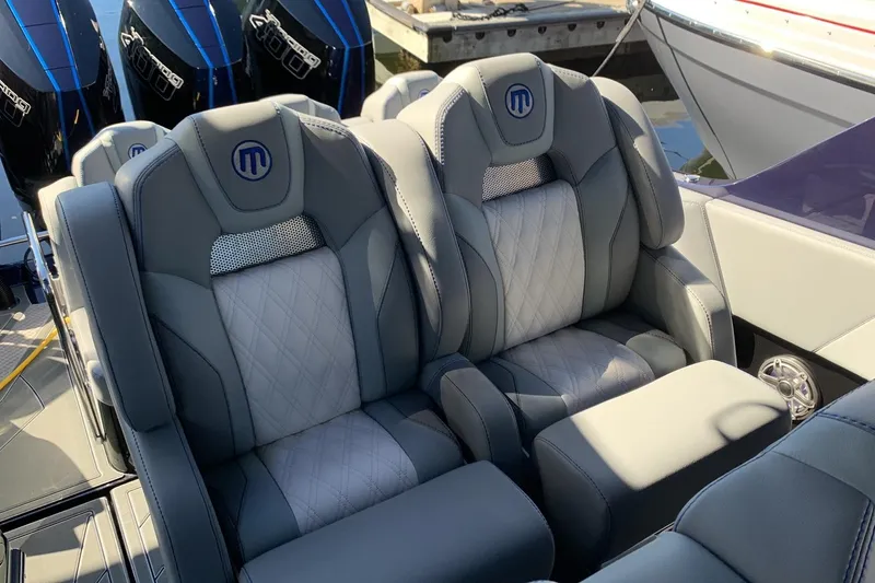 Slide: The Image of Luxurious seating on 2026 Mystic Powerboats M3800, featuring sleek design and premium materials. - 9
