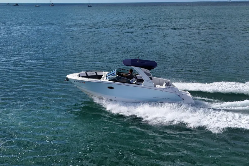 Slide: The Image of 2019 Chaparral 227 SSX speedboat cruising on open water. - 6