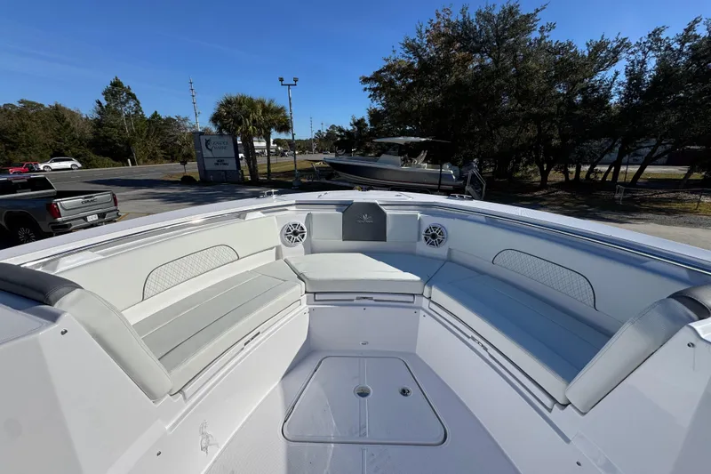 Slide: The Image of 2026 Bertram 34 CC boat interior with spacious seating and modern design. - 20