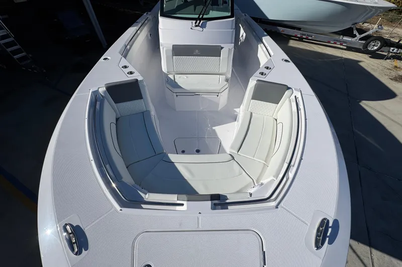 Slide: The Image of 2026 Bertram 34 CC boat with spacious seating and modern design. - 22