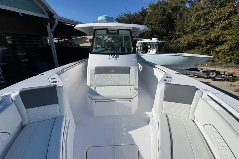 Slide: The Image of 2026 Bertram 34 CC boat with spacious seating and modern design. - 24