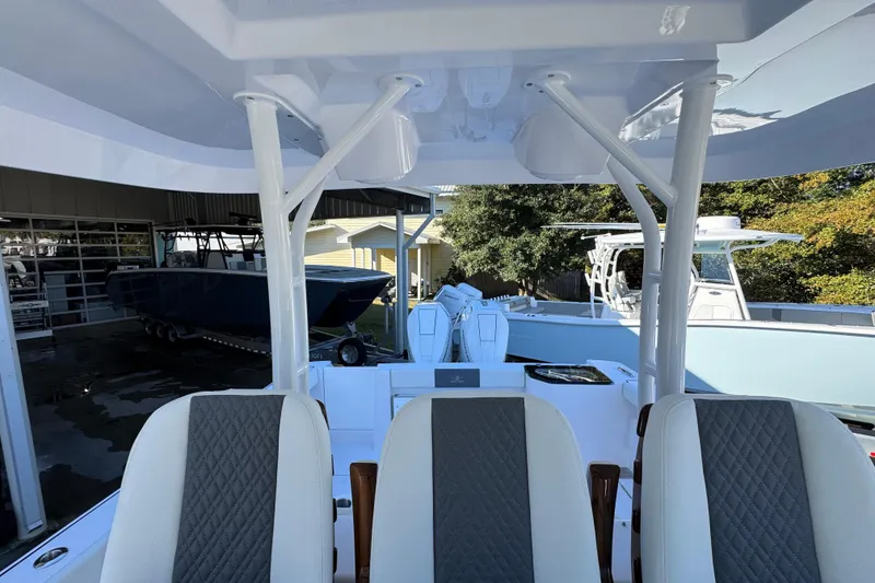 Slide: The Image of 2026 Bertram 34 CC boat interior with modern seating and sleek design. - 30