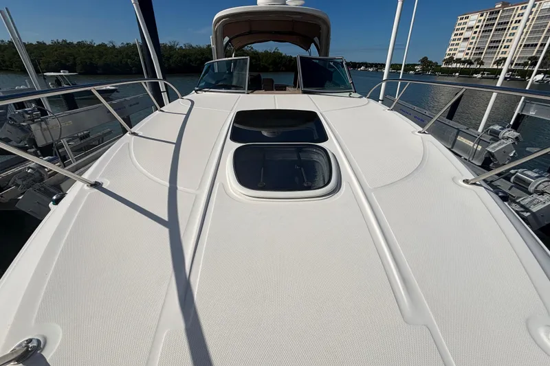 Slide: The Image of 2017 Sea Ray 310 Sundancer yacht deck with sleek design and spacious layout. - 3