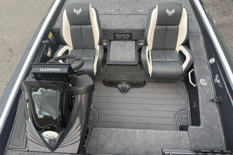 Slide: The Image of 2025 Phoenix 919 ZXL boat interior with Garmin system and dual seats. - 6