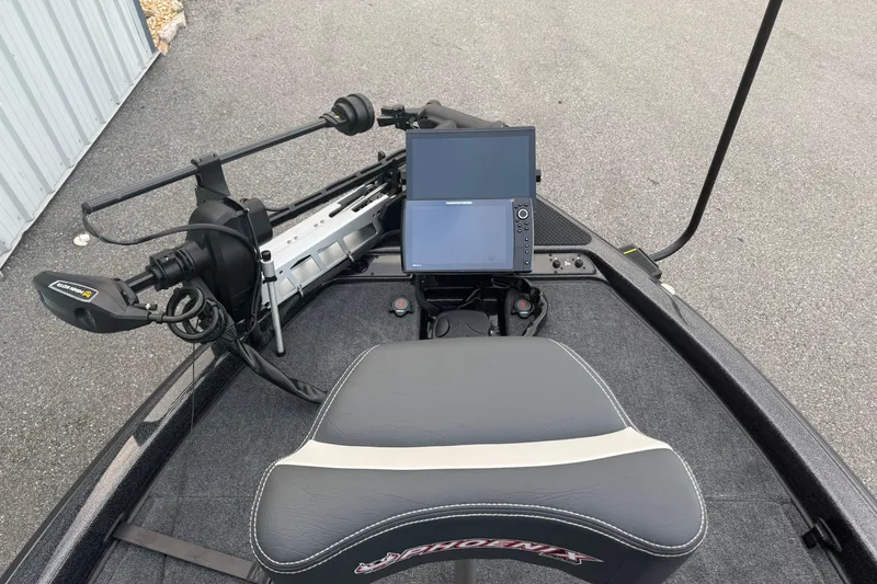 Slide: The Image of 2025 Phoenix 919 ZXL boat with advanced navigation system and comfortable seating. - 8