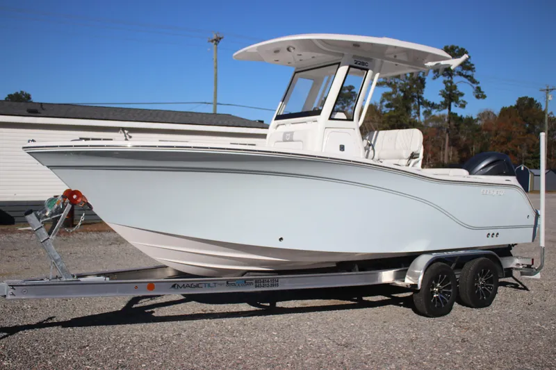 The Image of 2026 Sea Fox 228 Commander boat on trailer, side view, outdoors. - 1