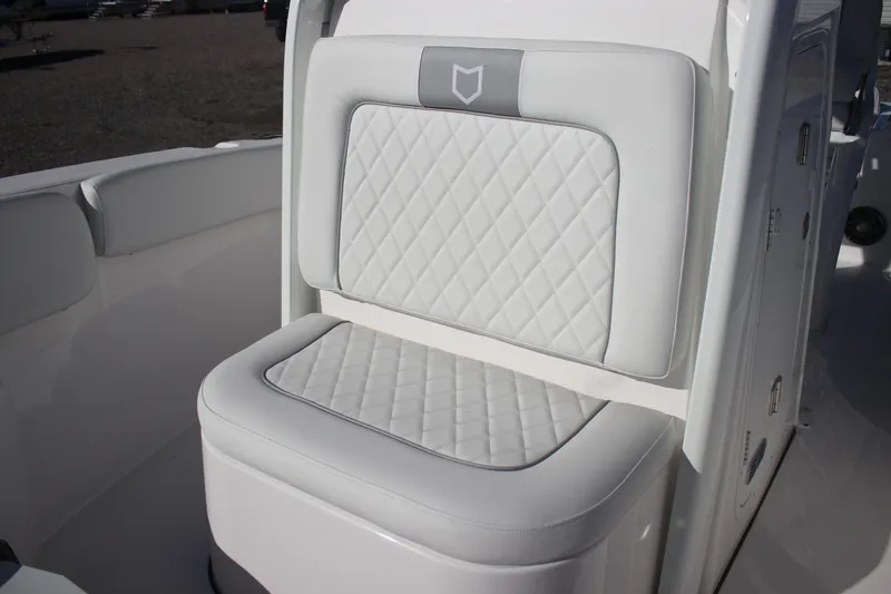 Slide: The Image of 2026 Sea Fox 228 Commander boat seat with diamond-patterned upholstery. - 10