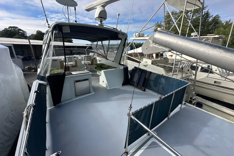 Slide: The Image of 1985 Pearson 43 Trawler with spacious deck and modern navigation equipment. - 37