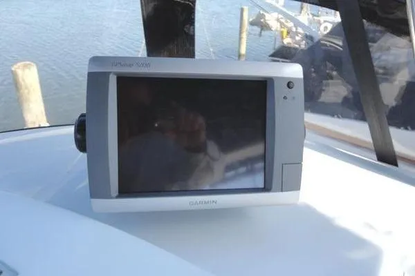 Slide: The Image of Garmin GPS device on 1985 Pearson 43 Trawler boat dashboard. - 47