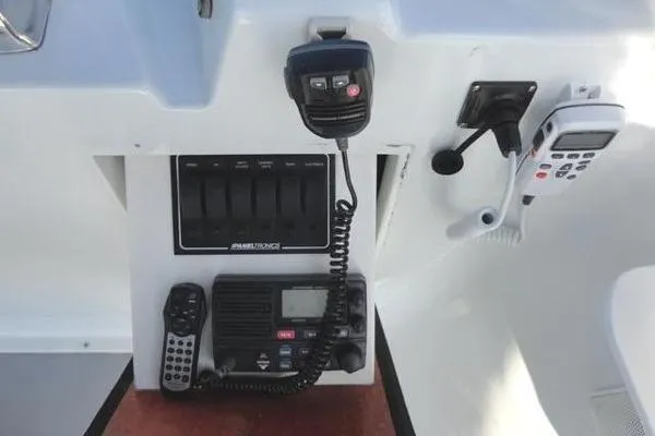 Slide: The Image of Control panel of a 1985 Pearson 43 Trawler with communication devices. - 48