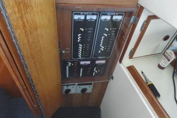Slide: The Image of Electrical panel on a 1985 Pearson 43 Trawler boat interior. - 57