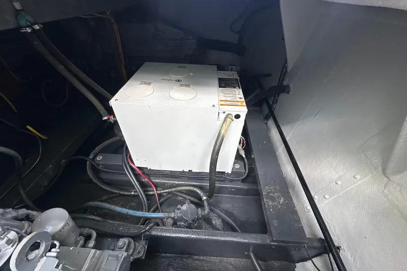 Slide: The Image of Engine room of 1985 Pearson 43 Trawler with electrical components and wiring. - 62