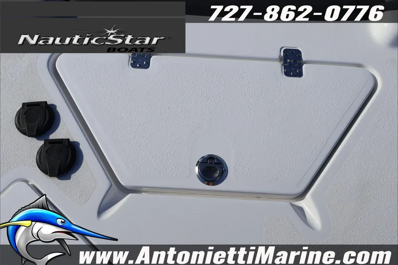 Slide: The Image of 2026 NauticStar 251 Hybrid boat deck with storage hatch and contact details. - 10