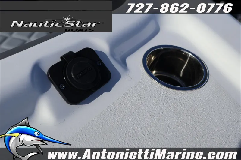 Slide: The Image of 2026 NauticStar 251 Hybrid boat detail with cup holder and plug, Antonietti Marine branding. - 12