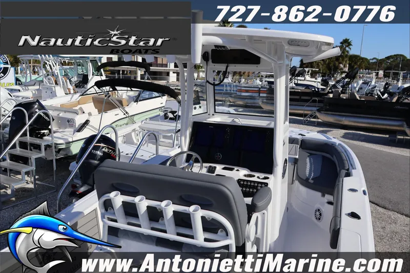 Slide: The Image of 2026 NauticStar 251 Hybrid boat at Antonietti Marine dealership. - 14