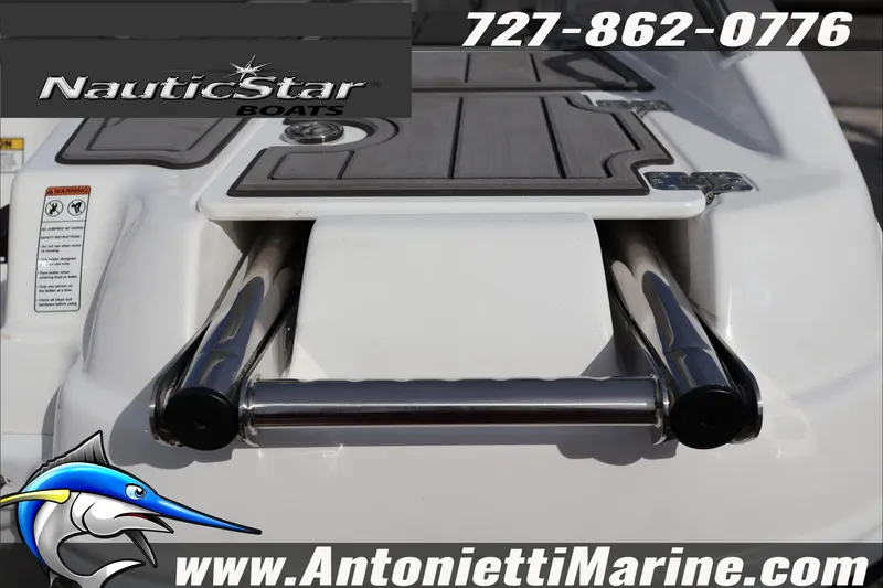 Slide: The Image of 2026 NauticStar 251 Hybrid boat with swim platform and ladder, Antonietti Marine branding. - 15