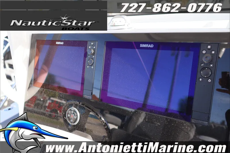 Slide: The Image of 2026 NauticStar 251 Hybrid boat dashboard with dual Simrad displays, contact info, and logo. - 20