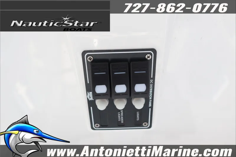 Slide: The Image of 2026 NauticStar 251 Hybrid boat control panel with switches, Antonietti Marine branding. - 21