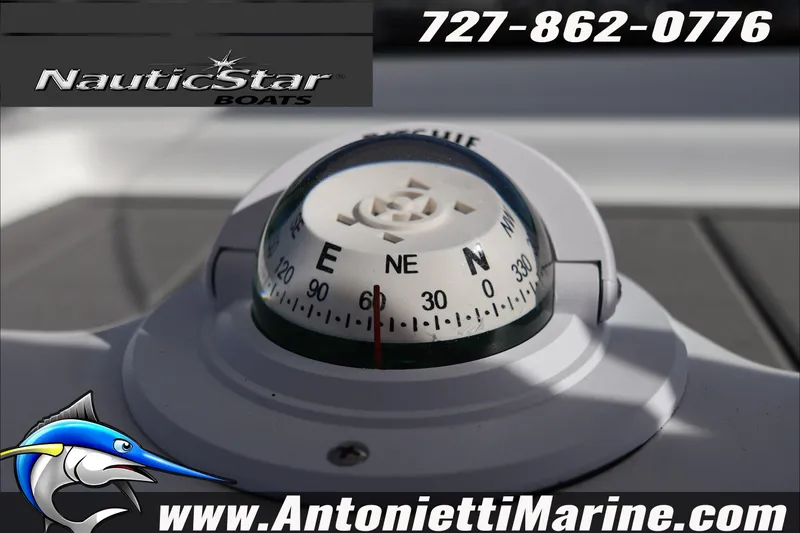 Slide: The Image of Compass on NauticStar 251 Hybrid boat, 2026 model, with contact details and logo. - 23