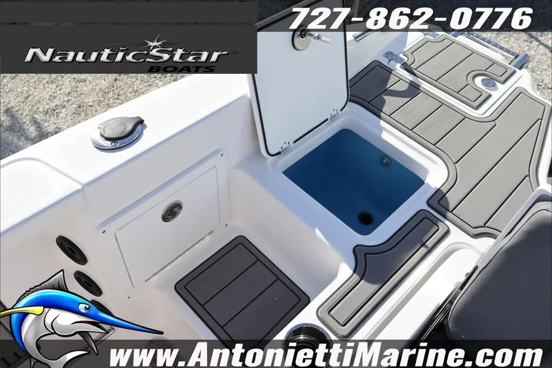 Slide: The Image of 2026 NauticStar 251 Hybrid boat interior with storage compartments and seating. - 27