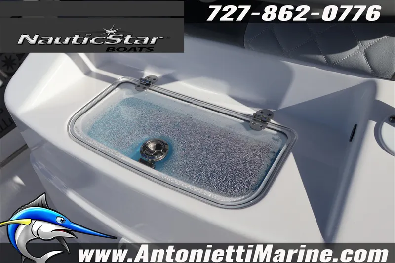 Slide: The Image of 2026 NauticStar 251 Hybrid boat livewell with contact details and logo. - 29