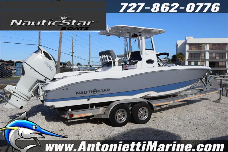 Slide: The Image of 2026 NauticStar 251 Hybrid boat on trailer, displayed at Antonietti Marine. - 3