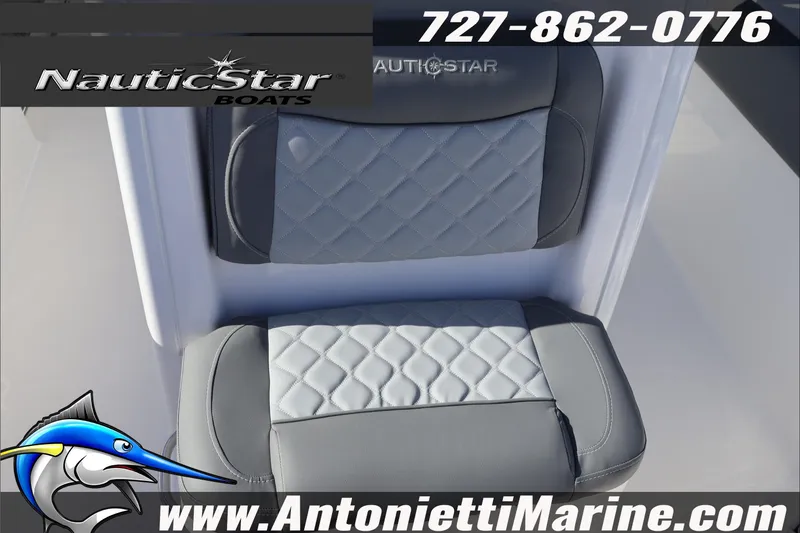 Slide: The Image of 2026 NauticStar 251 Hybrid boat seat with quilted design, featuring branding and contact details. - 33