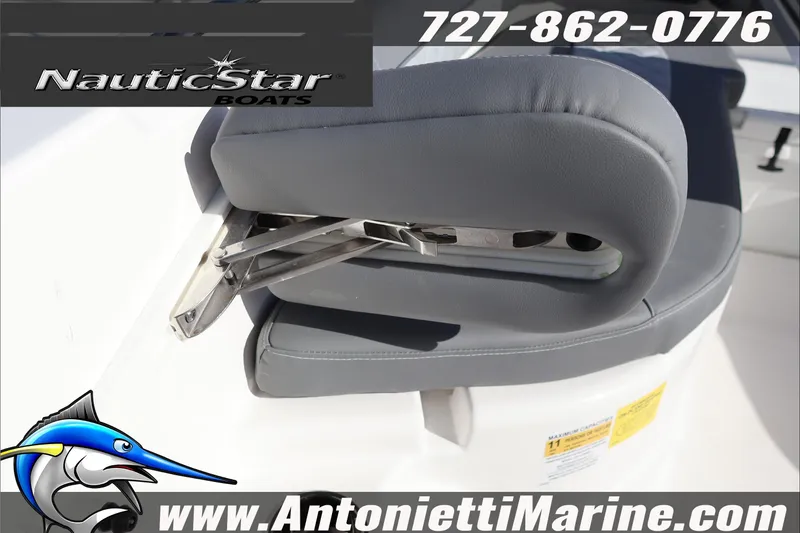 Slide: The Image of 2026 NauticStar 251 Hybrid boat seat detail with contact information and logo. - 38