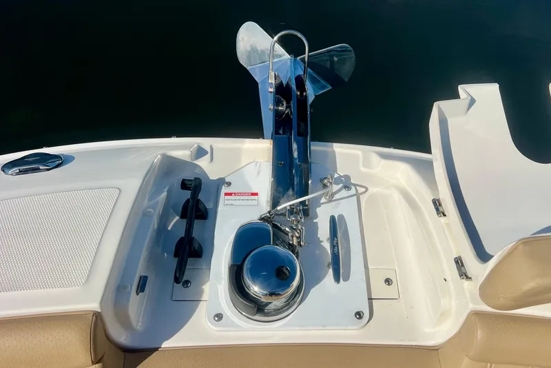Slide: The Image of 2019 Sea Ray SDX 290 Outboard anchor system on deck, featuring chrome details. - 21
