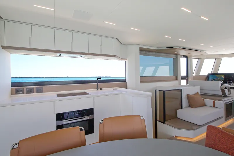 Slide: The Image of Luxurious interior of 2027 Pardo Yachts E72 with modern kitchen and seating area. - 3