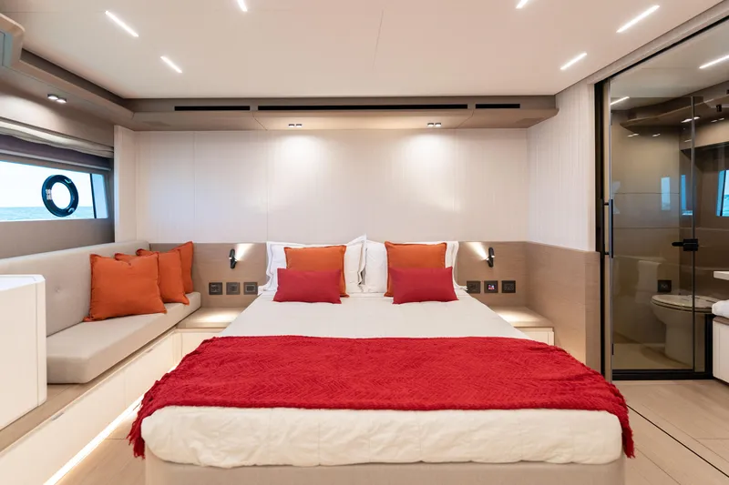 Slide: The Image of Luxurious bedroom interior of 2027 Pardo Yachts E72, featuring modern design and vibrant accents. - 8