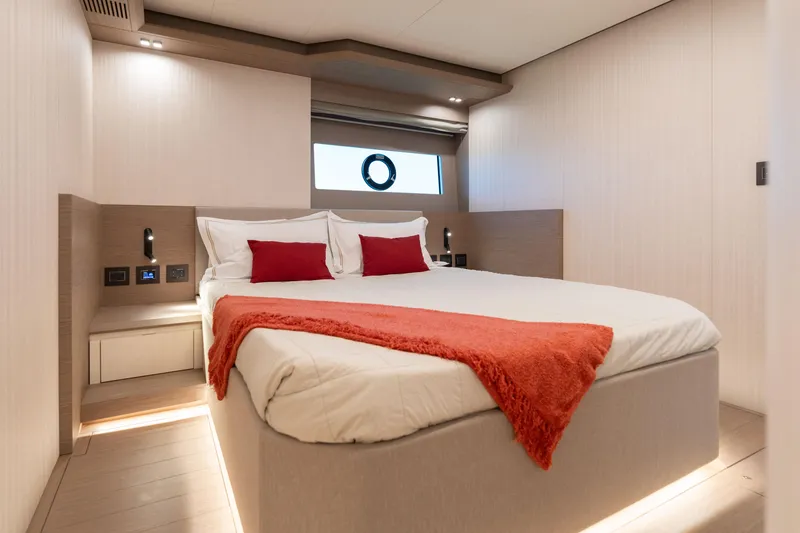 Slide: The Image of Luxurious bedroom interior of 2027 Pardo Yachts E72 with modern design and cozy bedding. - 12
