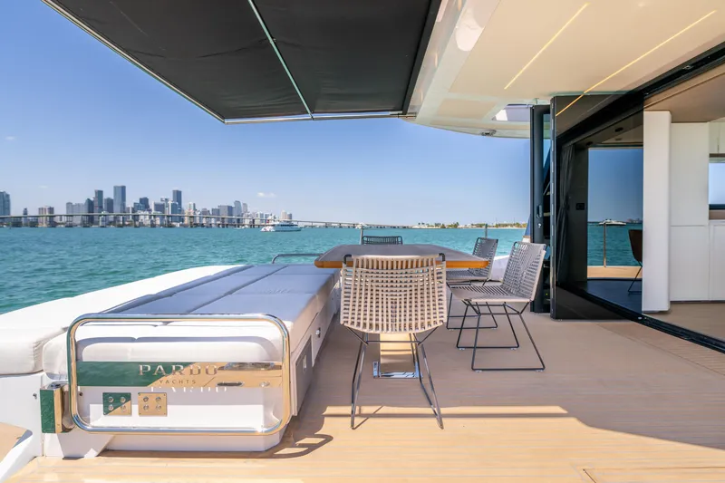 Slide: The Image of Luxury Pardo Yachts E72, 2027 model, with elegant deck and city skyline view. - 15