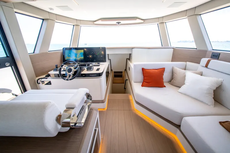 Slide: The Image of Luxurious interior of 2027 Pardo Yachts E72 with modern helm and plush seating. - 21