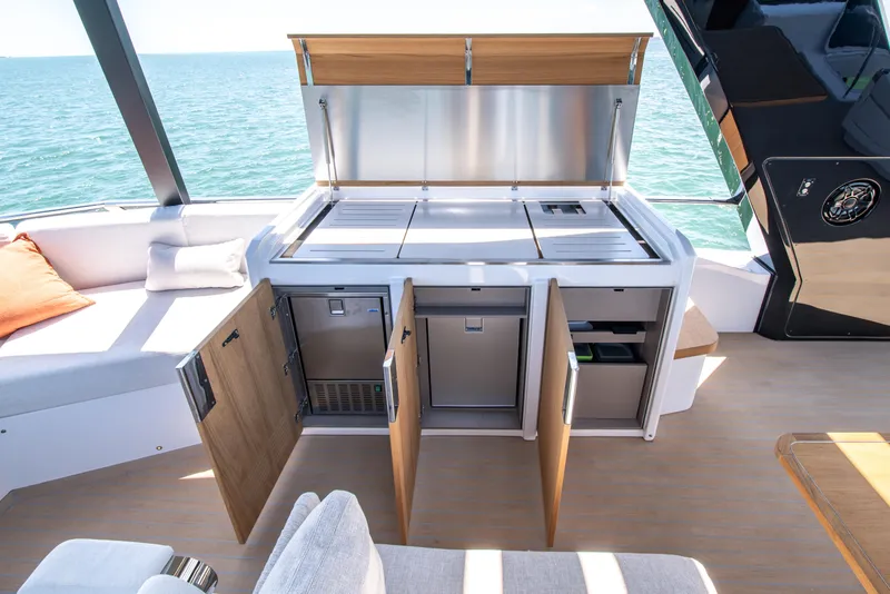 Slide: The Image of Luxurious outdoor kitchen on 2027 Pardo Yachts E72, featuring modern appliances and ocean view. - 33