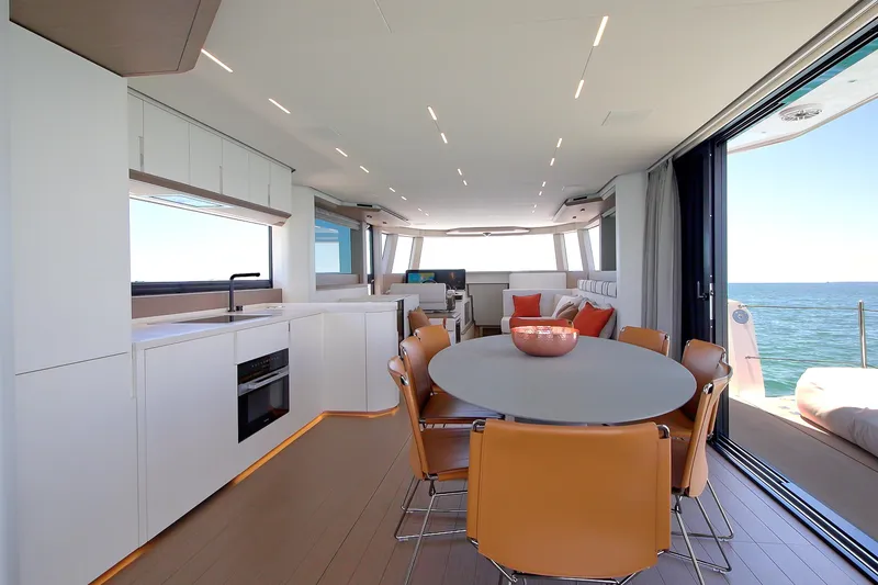 Slide: The Image of Luxurious interior of 2027 Pardo Yachts E72 with modern kitchen and ocean view. - 5