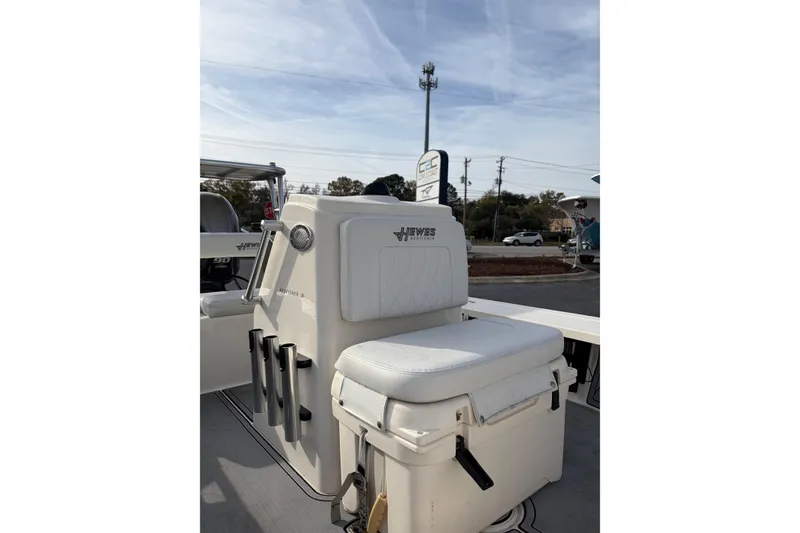 Slide: The Image of 2021 Hewes Redfisher 16 boat interior with seating and rod holders. - 7