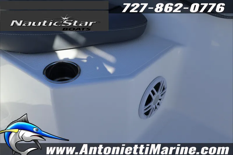 Slide: The Image of 2026 NauticStar 231 Hybrid boat interior with cup holder and speaker, Antonietti Marine branding. - 16