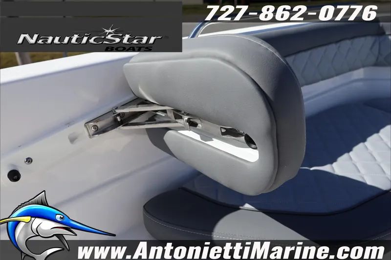 Slide: The Image of 2026 NauticStar 231 Hybrid boat interior with gray seating and adjustable armrest. - 20