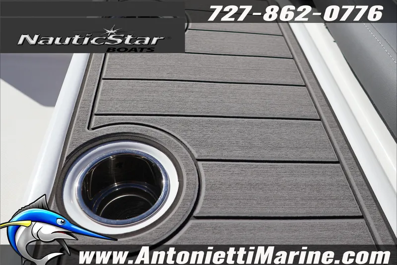 Slide: The Image of 2026 NauticStar 231 Hybrid boat deck with cup holder, Antonietti Marine branding. - 22