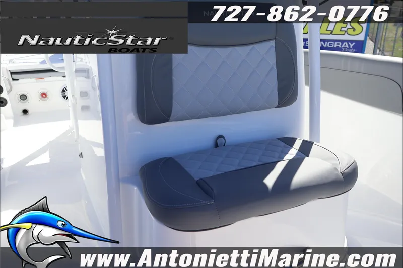 Slide: The Image of 2026 NauticStar 231 Hybrid boat seat with logo and contact details. - 23