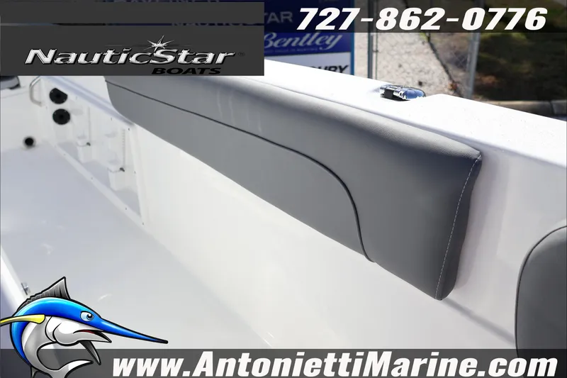 Slide: The Image of 2026 NauticStar 231 Hybrid boat interior with padded seating, Antonietti Marine branding. - 25